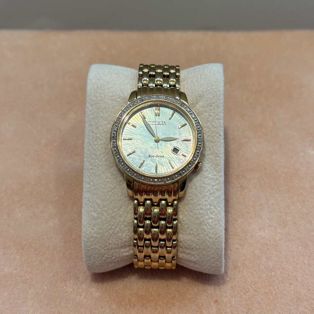 Women’s Citizen Eco- Drive Gold Watch.